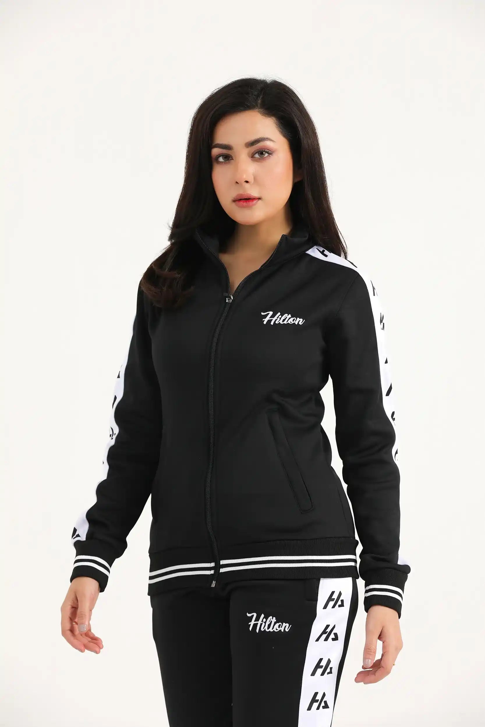 Shop the Hilton Aesthetics women’s contrast zip-up jacket with a soft brushed interior, secure zip pockets, branded sleeve panels and a fitted shape.