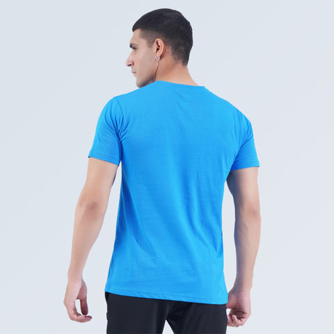 Back view of Crest Tee in Sky Blue, 100% cotton crew neck T-shirt by Hilton Aesthetics