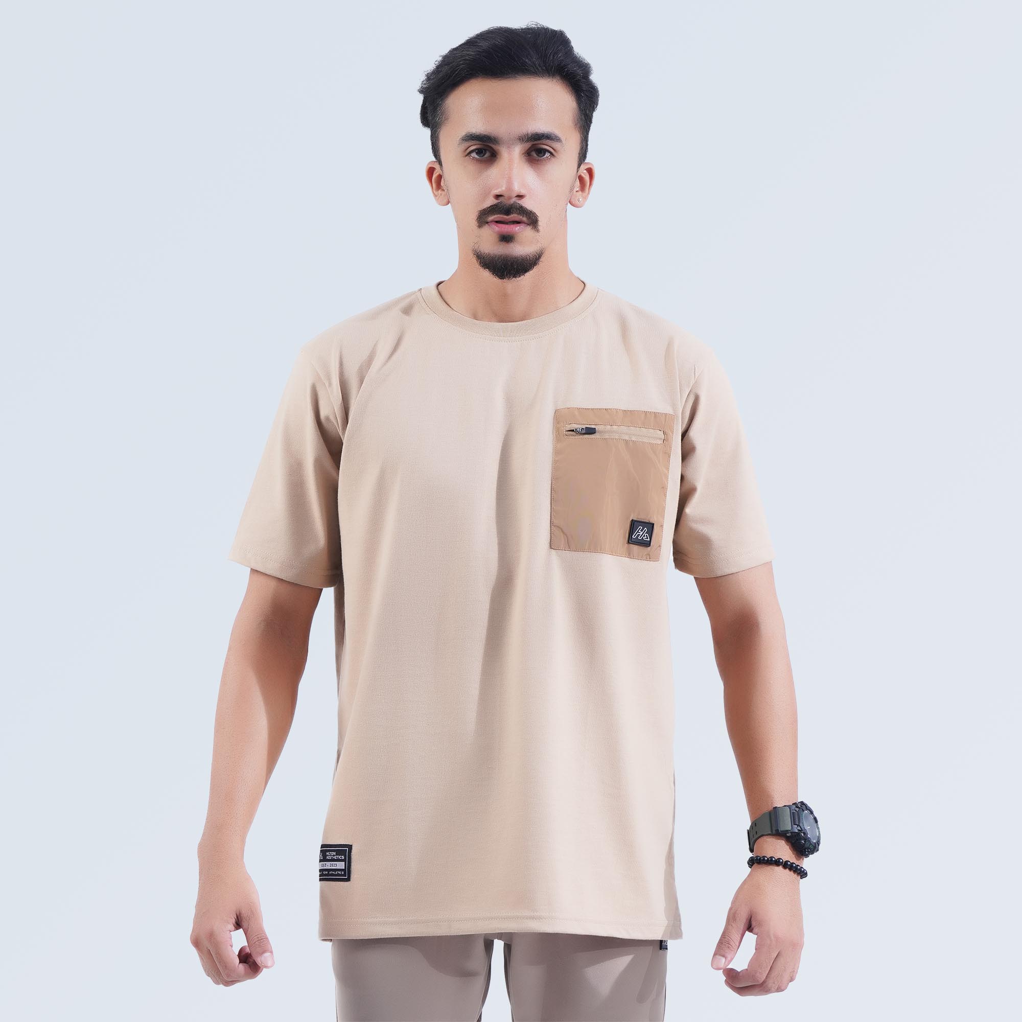 Men's Khaki Oversized T-Shirt with breathable fabric and Hilton Aesthetics logo