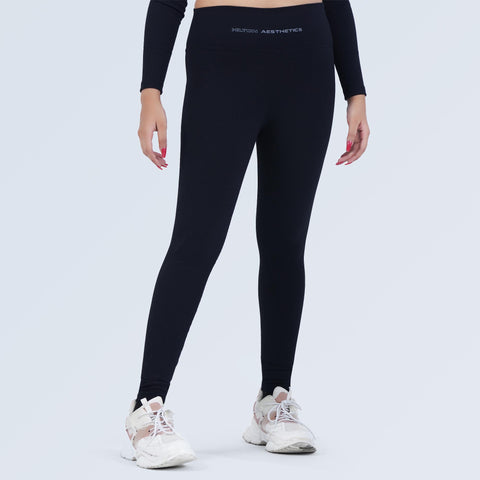 Black high-waist ribbed leggings with a supportive fit, three-quarter view