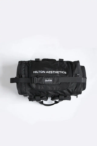 Top view of Hilton Aesthetics Everyday Holdall Gym Bag in Black featuring secure zip closure and durable construction.