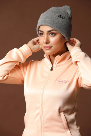 Model wearing Hilton Aesthetics Essential Foldover Beanie in grey for everyday comfort and warmth