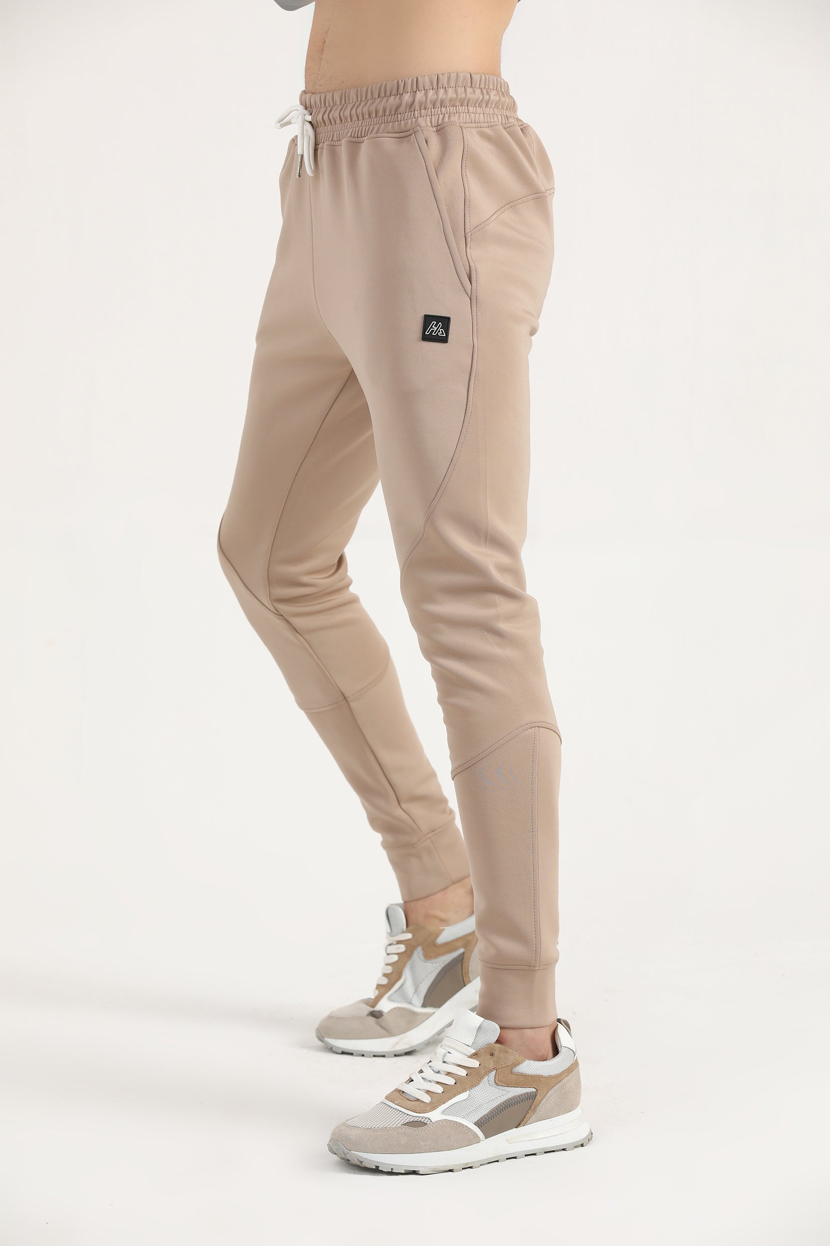Elements Cuffed Joggers in Khaki – Hilton Aesthetics side view, performance fit sweatpants