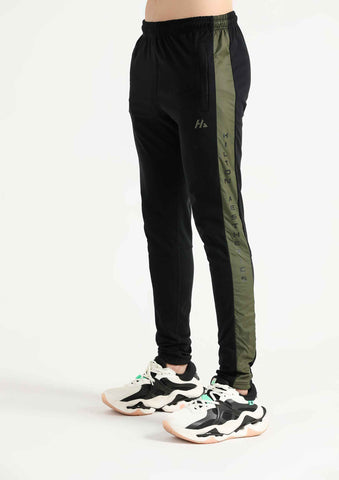 Black men’s Elite Joggers with tapered fit and elastic waistband, front angled view