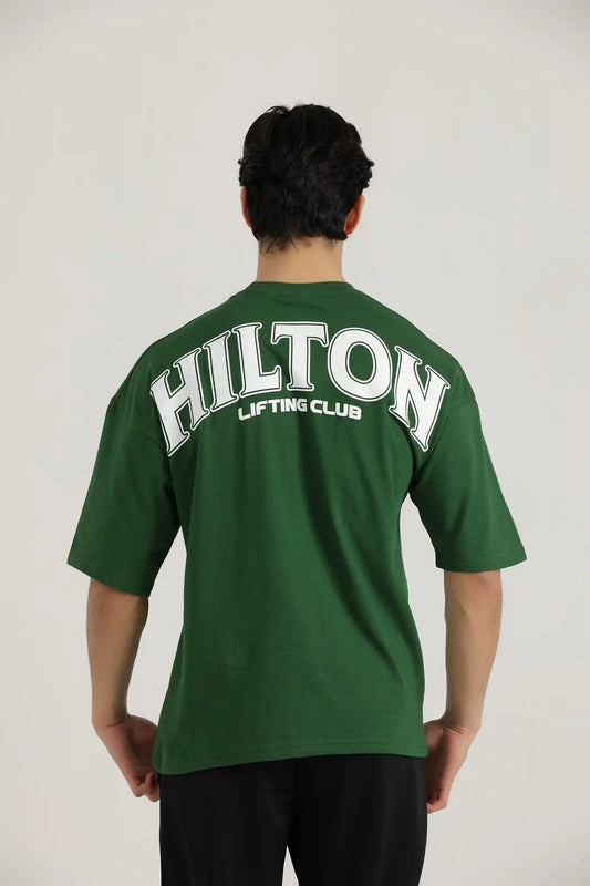 Hilton Aesthetics Lifting Oversized T-Shirt front view in green with relaxed fit and premium cotton fabric
