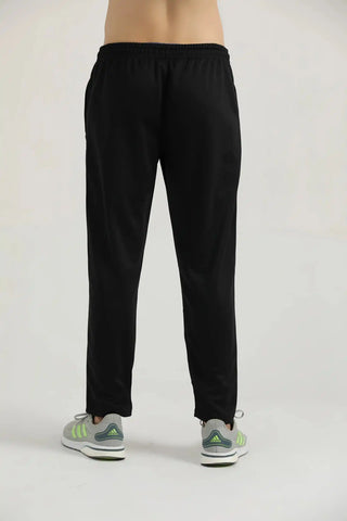 Front view of a model wearing black Hilton Aesthetics Lifting Relaxed Joggers.