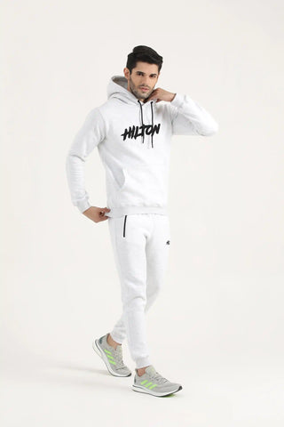 Model wearing Hilton Aesthetics Oatmeal Embroider Joggers in oatmeal for gym workouts and casual wear