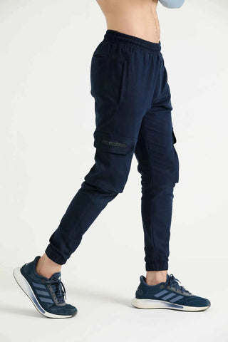 Men’s navy cargo joggers with tapered fit and side pockets, angled view