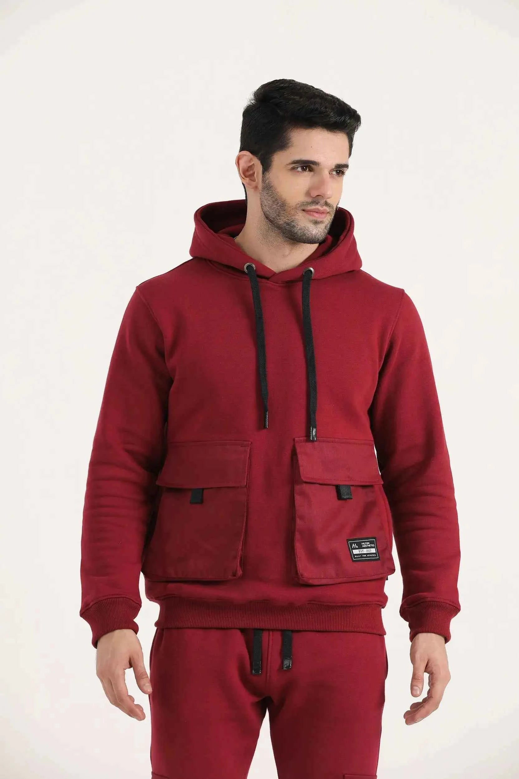 Men’s burgundy Hilton Aesthetics Crest Cargo Hoodie with matching joggers, front view