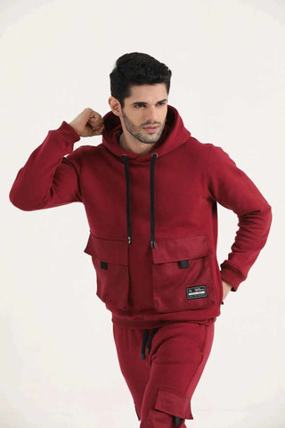 Men’s burgundy Crest Cargo Hoodie with drawcord and front cargo pockets, close-up