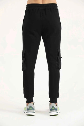 Men’s black Crest Cargo Joggers with tapered fit and cargo pockets, back view