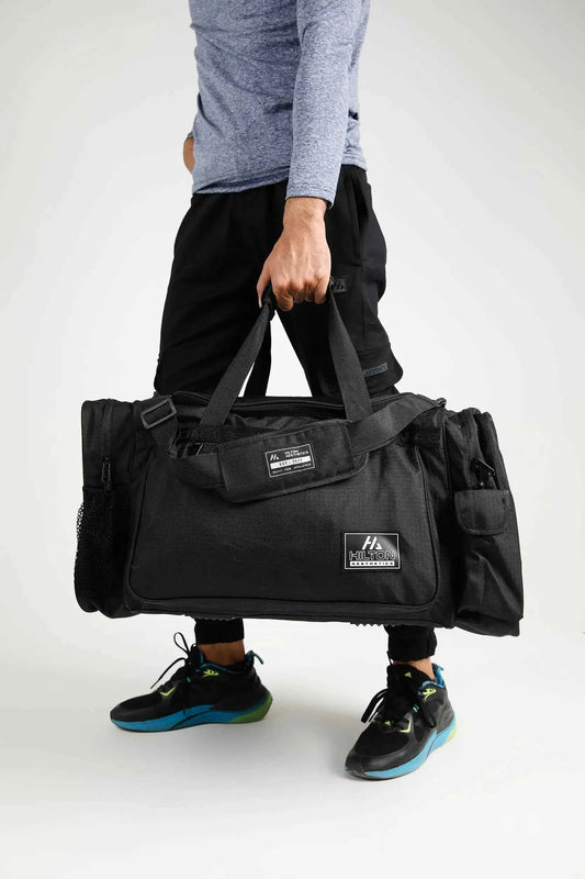 Essential Gym & Travel Duffel Bag with zipper pockets, shoulder strap and Hilton Aesthetics logo