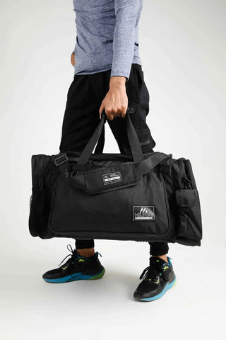 Essential Gym & Travel Duffel Bag with zipper pockets, shoulder strap and Hilton Aesthetics logo
