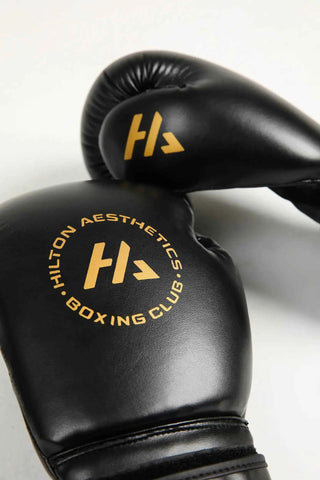 HA Premium Training Boxing Gloves with wrist support, knuckle protection and Hilton Aesthetics logo
